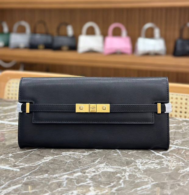 YVES SAINT LAURENT-MANHATTAN CLUTCH